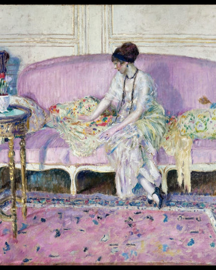 Woman Seated on Sofa in Interior